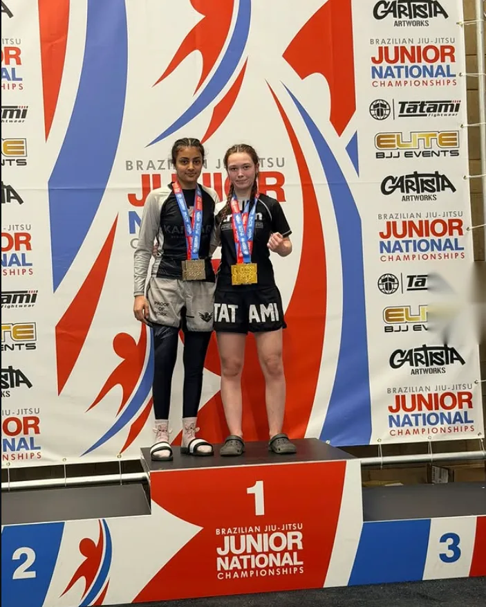 Karan Kaur Sahota on the top step of the podium at the BJJ Junior National Championships